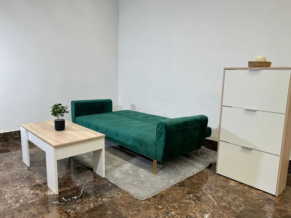 LIQUIDAÇAO TOTALSofá cama verde com pernas douradas por apenas 234,99€