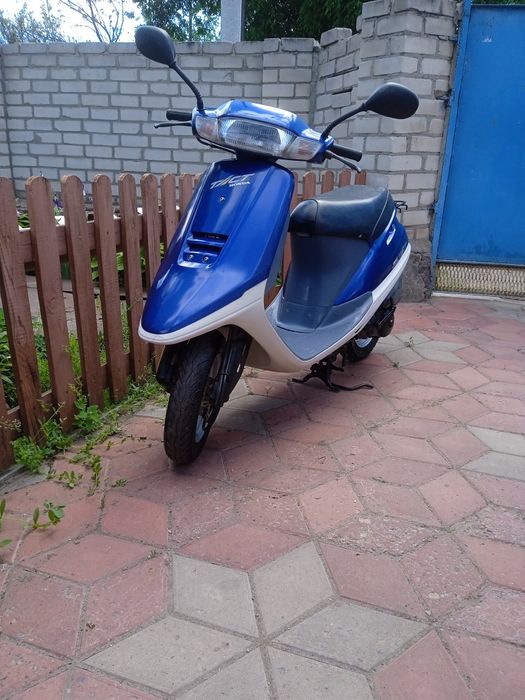 Honda Tact 24 stand up