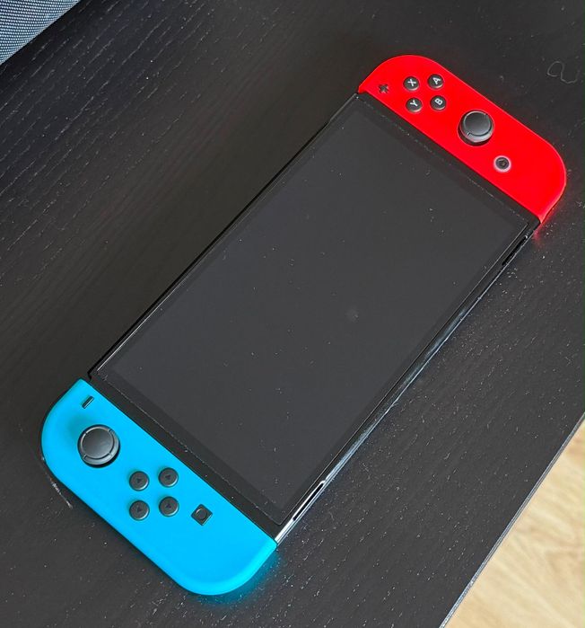 Nintendo Switch OLED + Acessórios + Mala de Transporte + 2 jogos