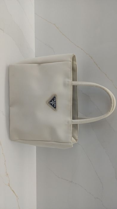 Bolsa bege em bom estado