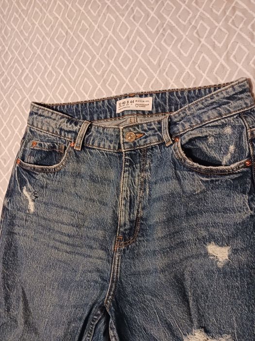 Calças de ganga rasgadas