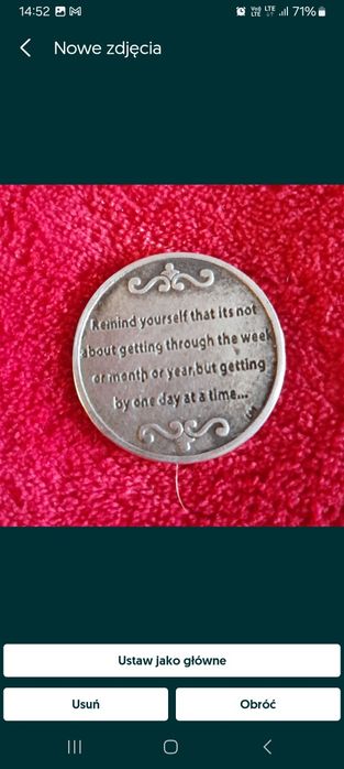 Medalik AA w języku angielskim