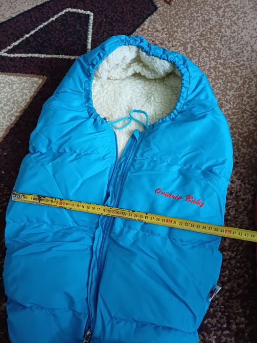 Конверт на Виписку!Продам два  зимових конверти в коляску на овчині.