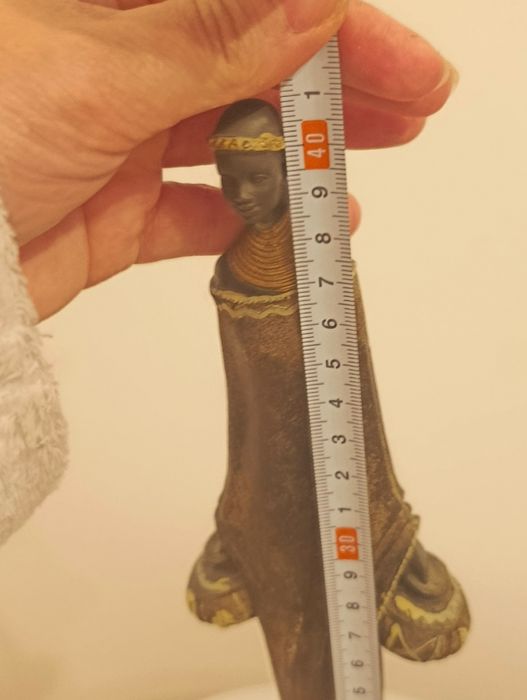 Agroturystyka  figurka  przedstawiająca postać