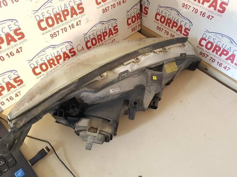 FAROL ESQUERDO FORD FOCUS SEDAN 2000 -