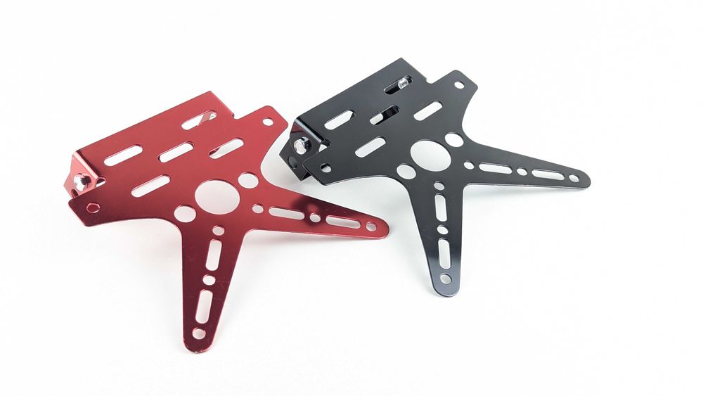 Універсальне Х-кріплення для мото номера з регулюванням кута