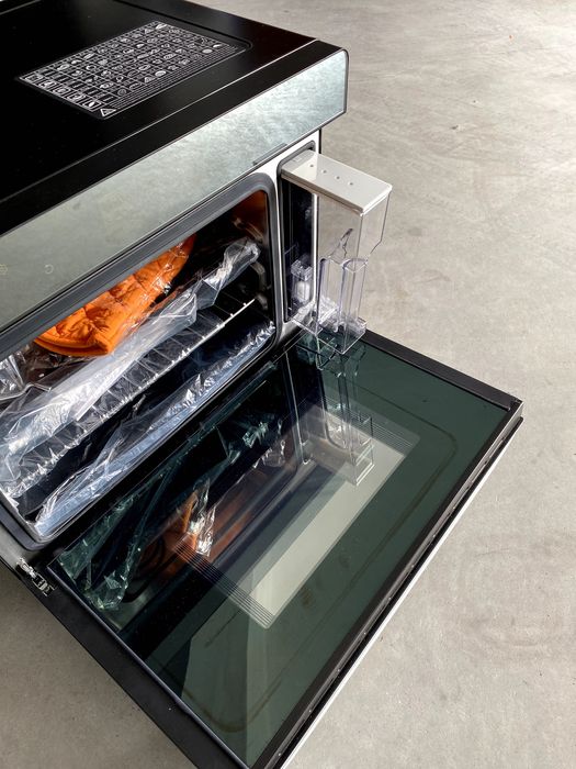Forno elétrico da marca Trisa, capaz de cozer a vapor NOVO