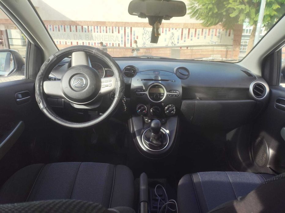 Mazda 2 1.3 gasolina +-211 mil KMS com AC 2010