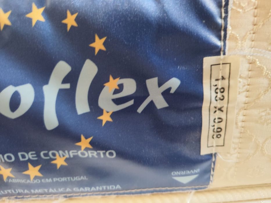Cama e máquina de lavar