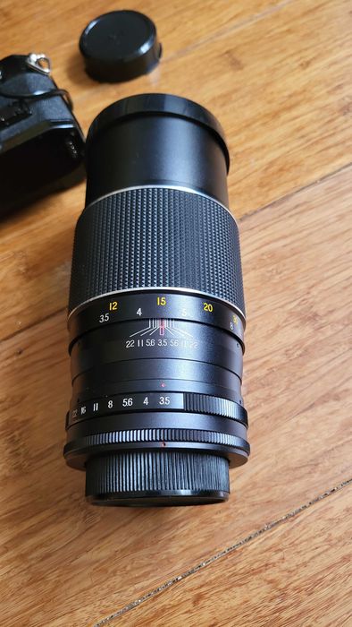 Zestaw aparat Canon A1, obiektyw, komplet konwerterów i torba