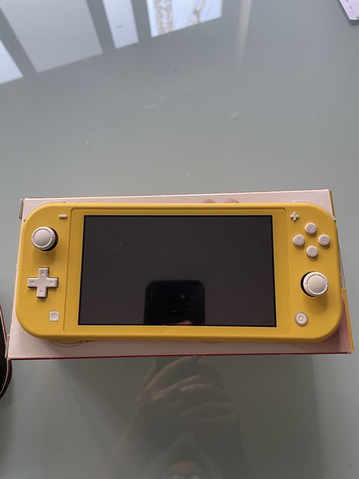 Nintendo switch lite + bolsa
