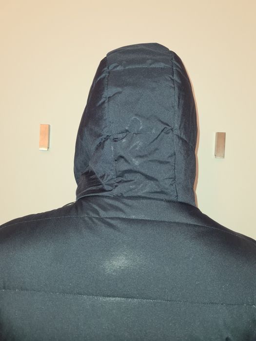 Casaco de penas de homem