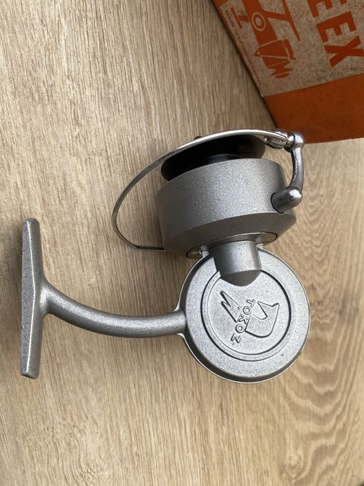 Kołowrotek Tokoz Reex nieuzywany .