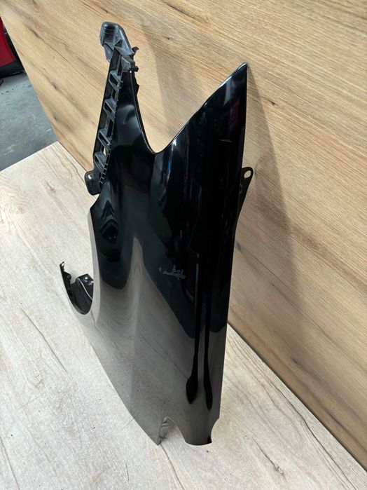 Błotnik przedni lewy Volkswagen Touran kolor lc9x