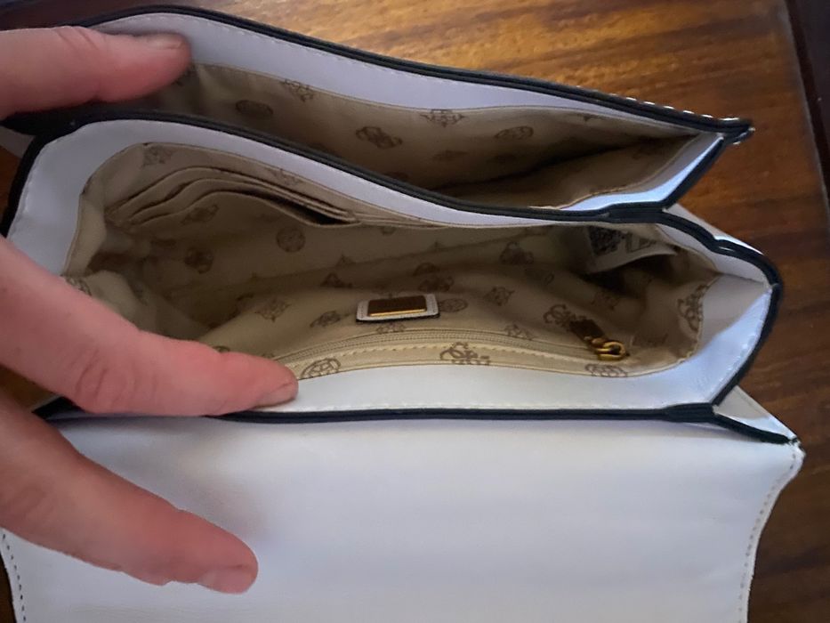 Mala guess pouco usada