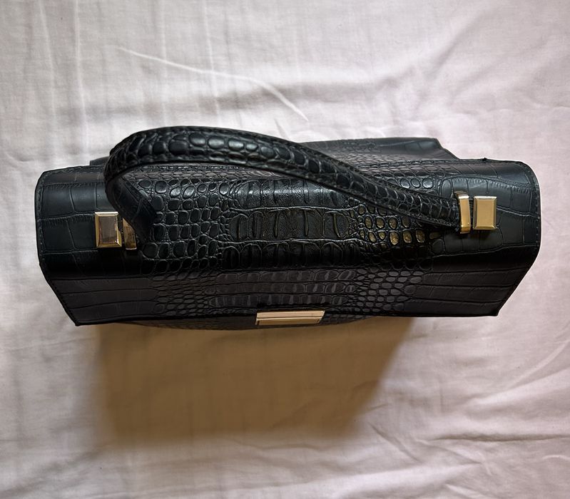 Mala estruturada Parfois efeito cobra. Nova