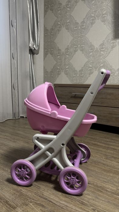 Дитяча коляска іграшкова