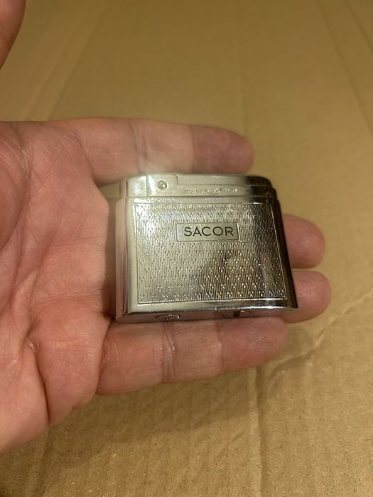 Sacor isqueiro antigo metal cromado raro