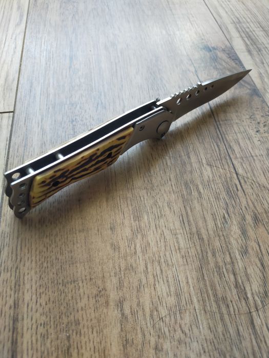 Nóż sprężynowy, składany