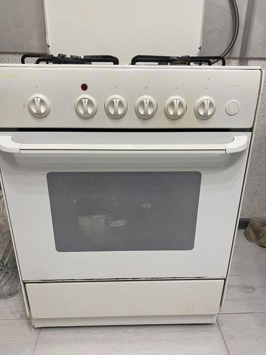 Газ.плита с эл .духовкой