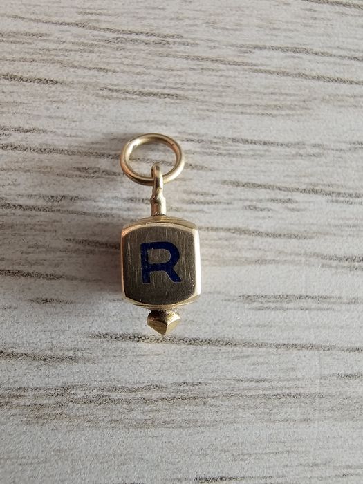 Pinguente Rapa em ouro 19,2k
