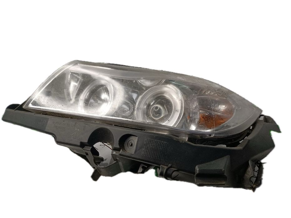 Ótica / farol esquerda BMW 3 (E90)