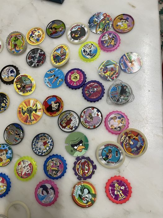 Comjunto de variadoa tazos e aceasorios