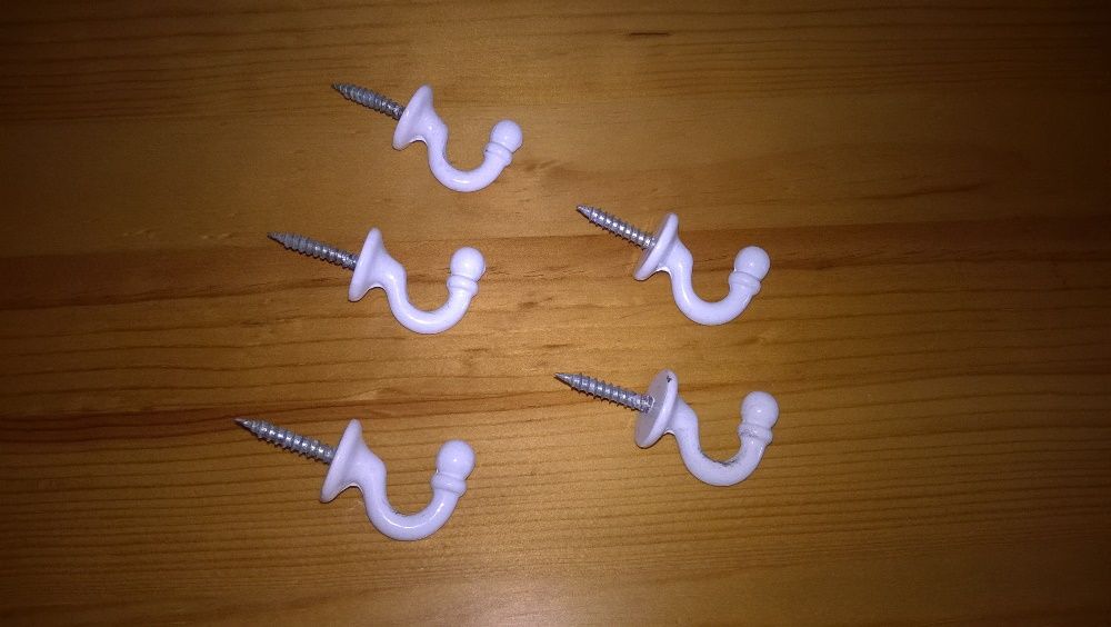 Fixadores de parede em esmalte para cabides