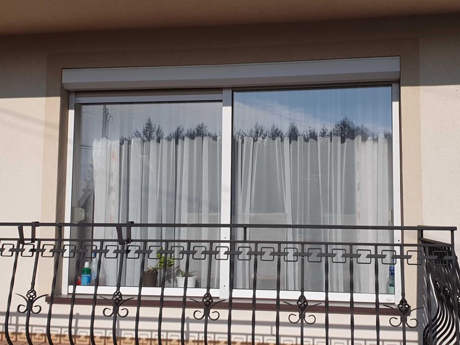 Okna drzwi balkonowe PCV białe 18szt  profil Rehau 2 szyby + rolety