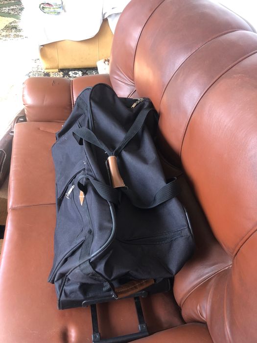 Trailer com rodas ou saco viagem mala