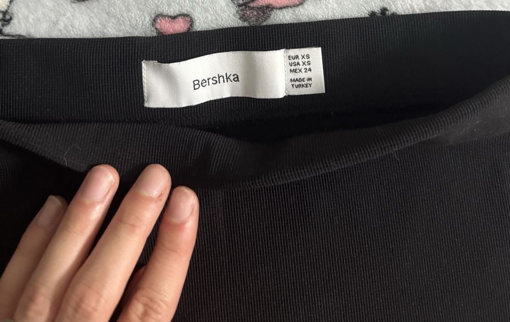 Міні-спідниці жіночі чорного кольору