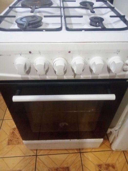 Продам (комбинированную) газовую + электро плиту Milano.