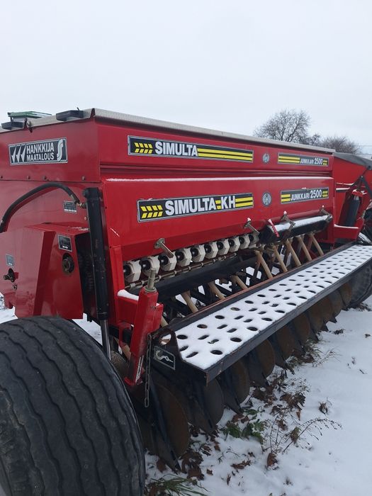 Дискова сівалка SIMULTA 2500 приципна з катками на два бачки