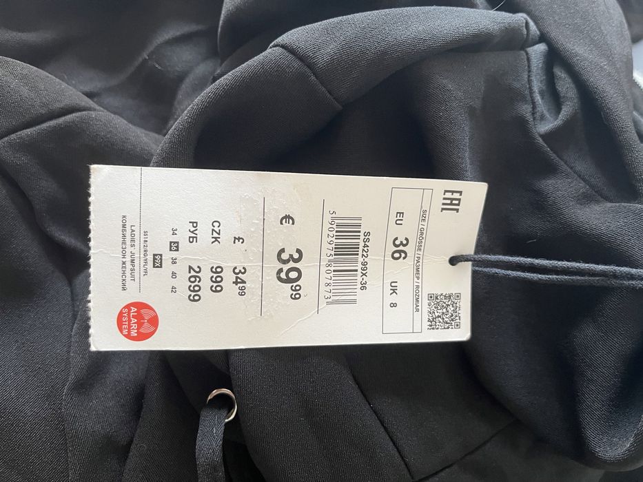 Czarny kombinezon reserved