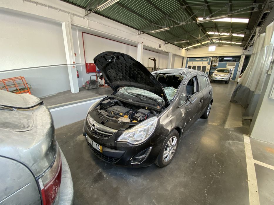 Opel Corsa D 1.2 Gasolina - Salvado