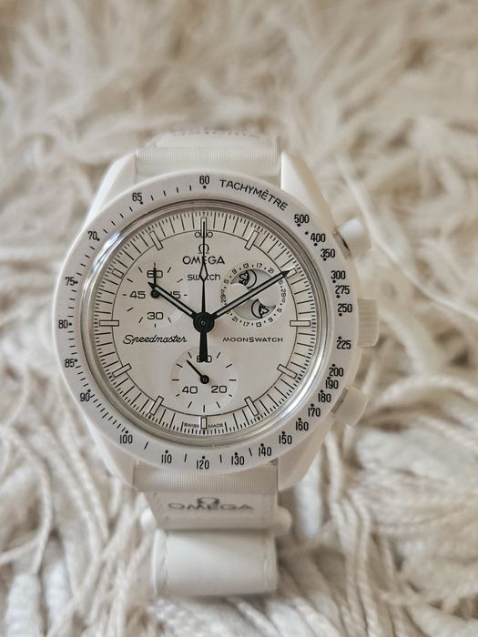 Годинник swatch omega