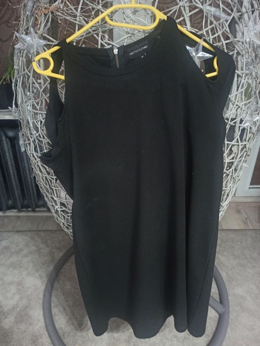 Tunika stan bardzo dobry rozm 10 .