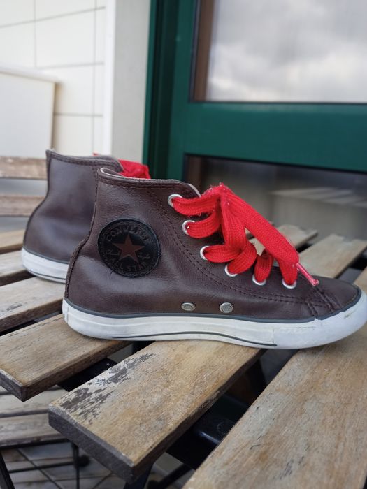 Sapatilhas Converse All Star em Pele