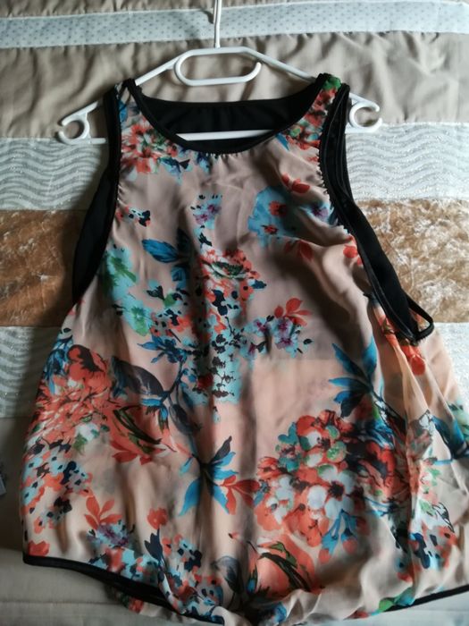 Blusa como nova