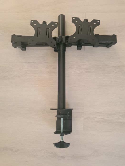 Sprzedam uchwyt na dwa monitory do 27 cali.