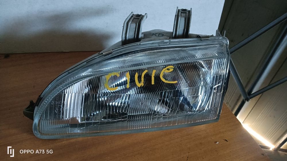 Farol Honda Civic eg5 ótica esquerda