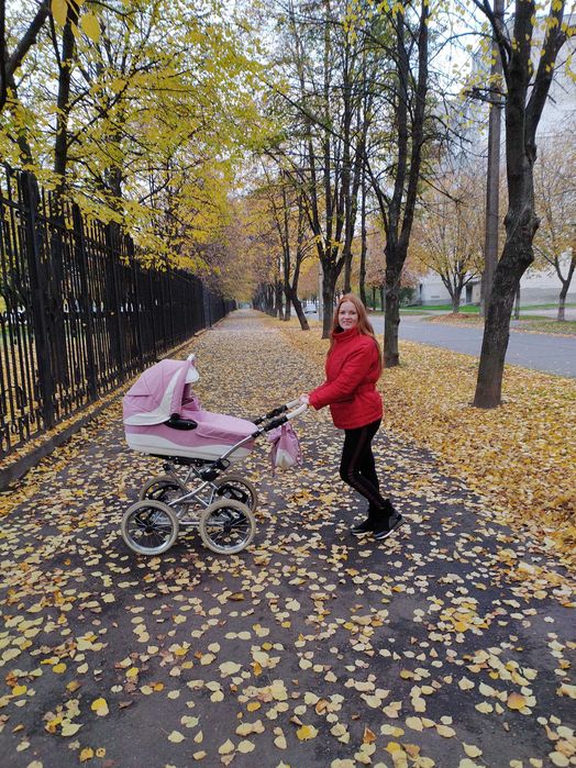 Коляска для девочки розовая 2 в 1  люлька и сидячее кресло