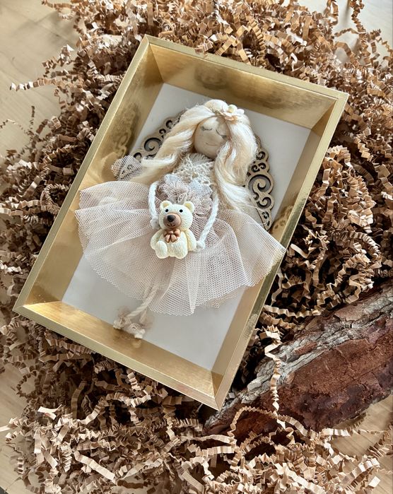 Aniołek w złotej ramce