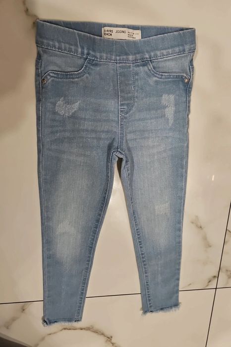 Primark jeansy na gumce 104 elastyczne jasny niebieski