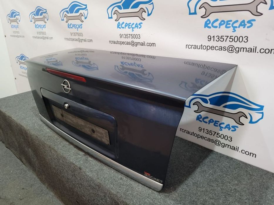 PORTA TAMPA MALA OPEL ASTRA G COUPE BERTONE FECHO PUXADOR 3º STOP