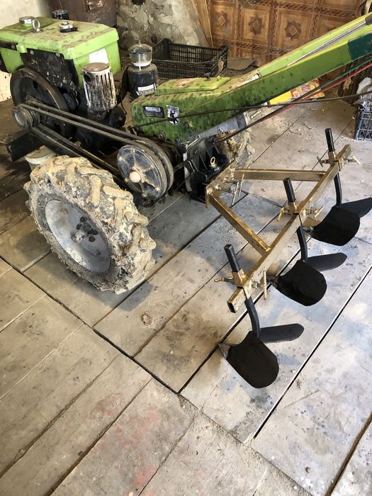 Плуги (марка) до мотоблока