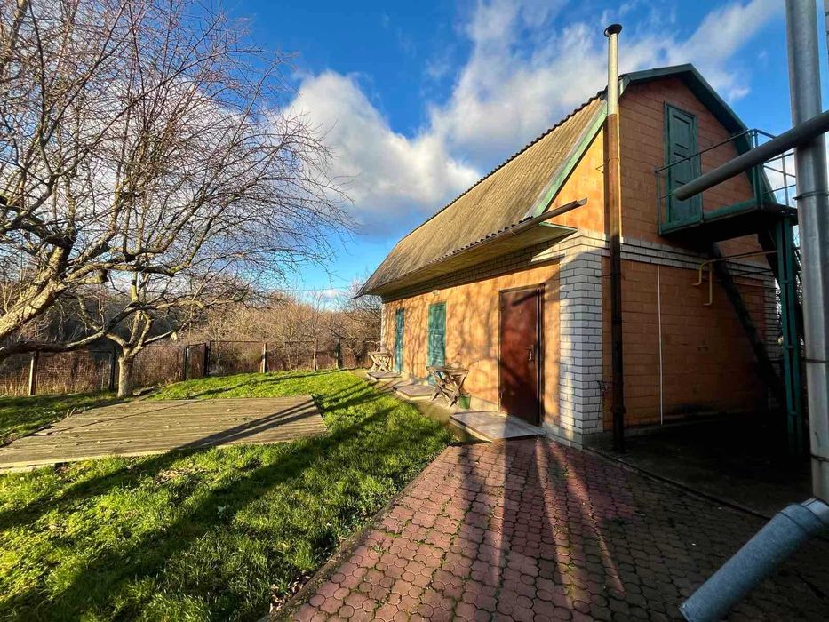 Продам (можна сертифікат) капітальний будинок з банею на березі р.Псел