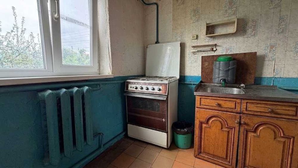 Продаж цегляного будинку 78м². 4 кімнати. 33 сотки. Центр. ID:813