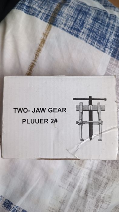 Знімач двухлаповий рейка з фіксацією 38х65мм