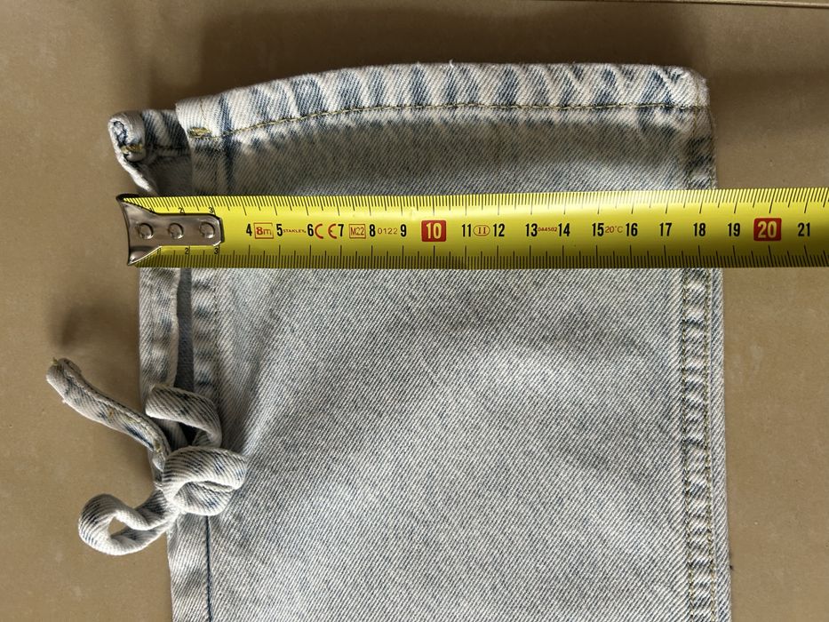 Jeansy Reserved z kokardkami rozm 140